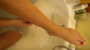 MILF Shaves her Legs in the Bathroom